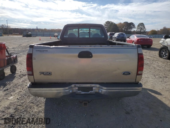 1999 Ford F-150 XL с VIN 1FTRF17L2XKA36749, выставлен на аукционе Copart как лот 84671444 с пробегом 148 338 миль миль и Списание • Salvage title. История ставок и продаж доступна на DreamBid. Изображение 6.
