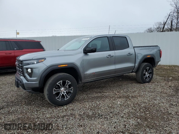 2023 GMC Canyon 4WD AT4 with VIN 1GTP6DEK5P1170230, listed as a Copart auction lot 52767295 with 26,769 mi miles and Salvage Title. Bid and sale history available at carsss.com. Image 1.