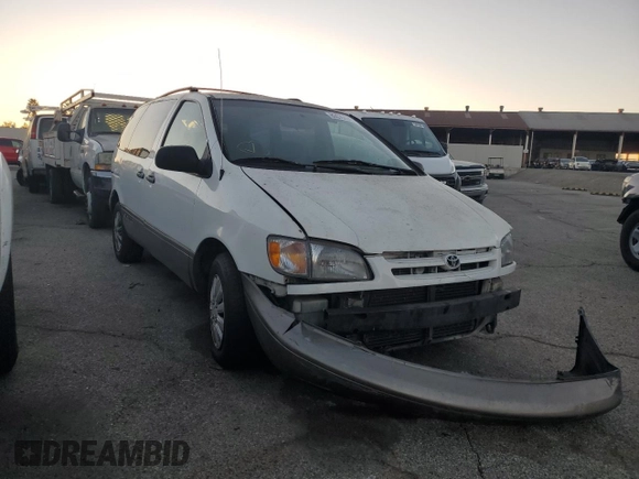 2000 Toyota Sienna LE with VIN 4T3ZF13CXYU184839, listed as a Copart auction lot 80035434 with 0 mi miles and Salvage Title. Bid and sale history available at carsss.com. Image 4.