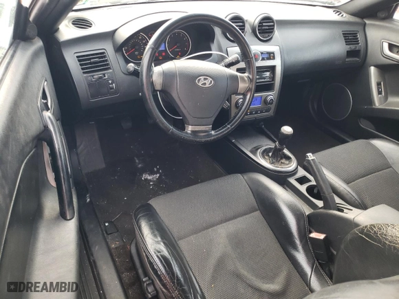 2008 Hyundai Tiburon GT with VIN KMHHN66F68U269896, listed as a Copart auction lot 87502765 with 196,437 mi miles and Salvage Title. Bid and sale history available at carsss.com. Image 8.