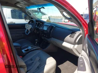 2014 Toyota Tacoma with VIN 5TFLU4EN4EX095917, listed as a IAAI auction lot 41820691 with 59,823 mi miles and . Bid and sale history available at DreamBid. Image 5.