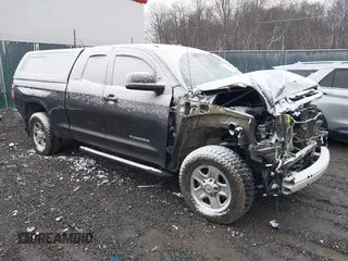 2018 Toyota Tundra SR with VIN 5TFUM5F14JX076641, listed as a IAAI auction lot 41125188 with 134,684 mi miles and . Bid and sale history available at DreamBid. Image 1.