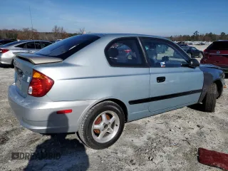 2003 Hyundai Accent with VIN KMHCF35C73U273610, listed as a Copart auction lot 85868294 with 168,203 mi miles and Salvage Title. Bid and sale history available at carsss.com. Image 3.