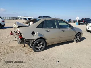 2001 Ford Focus ZTS with VIN 1FAHP383X1W204498, listed as a Copart auction lot 87933995 with 82,555 mi miles and Salvage Title. Bid and sale history available at carsss.com. Image 3.