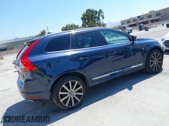 2015 Volvo XC60 T5 Drive-E Premier with VIN YV440MDK0F2685308, listed as a IAAI auction lot 42783695 with 140,561 mi miles and . Bid and sale history available at DreamBid. Image 4.