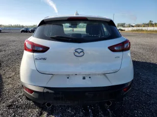 2020 Mazda CX-3 GS z VIN JM1DKFC79L1472123, wystawiony jako Copart lot #73379514 z przebiegiem 85 815 mil mil oraz Szkoda całkowita • Salvage title. Historia ofert i sprzedaży dostępna na DreamBid. Obrazek 6.