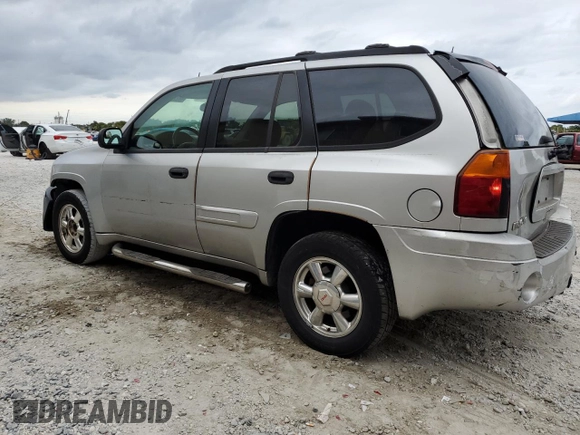 2005 GMC Envoy SLT with VIN 1GKDS13S352101385, listed as a Copart auction lot 89271025 with 165,670 mi miles and Salvage Title. Bid and sale history available at carsss.com. Image 2.