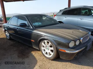 2004 Jaguar XJ 8 with VIN SAJEA71CX4SG02780, listed as a IAAI auction lot 42719531 with Not provided miles and . Bid and sale history available at DreamBid. Image 1.