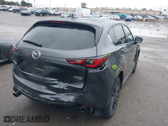 2022 Mazda CX-5 2.5 Turbo with VIN JM3KFBAY8N0647204, listed as a IAAI auction lot 41567490 with 40,396 mi miles and . Bid and sale history available at carsss.com. Image 4.