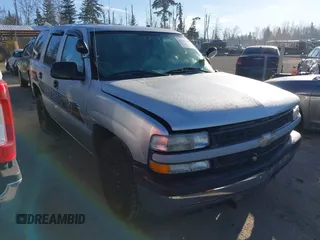 2005 Chevrolet Tahoe Police z VIN 1GNEC13Z95R205193, wystawiony jako IAAI lot #41361544 z przebiegiem 156 547 mil mil oraz . Historia ofert i sprzedaży dostępna na DreamBid. Obrazek 1.