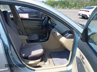 2007 Mazda 3 i Sport with VIN JM1BK32F271707045, listed as a IAAI auction lot 42166852 with 101,693 mi miles. Bid and sale history available at carsss.com. Image 5.