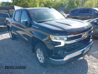 2025 Chevrolet Silverado 1500 LT with VIN 1GCUKDED3SZ122848, listed as a IAAI auction lot 41990196 with 23,455 mi miles and . Bid and sale history available at DreamBid. Image 1.