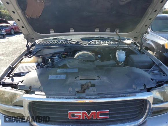 2005 GMC Yukon SLE with VIN 1GKEC13T95J150381, listed as a Copart auction lot 77405144 with 176,516 mi miles and Clean Title. Bid and sale history available at carsss.com. Image 12.