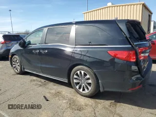 2023 Honda Odyssey EX-L with VIN 5FNRL6H67PB057737, listed as a Copart auction lot 53464695 with 21,144 mi miles and Salvage Title. Bid and sale history available at DreamBid. Image 2.