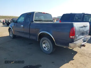 1999 Ford F-150 with VIN 2FTRX17L8XCB23329, listed as a IAAI auction lot 41448347 with 223,517 mi miles and . Bid and sale history available at DreamBid. Image 3.