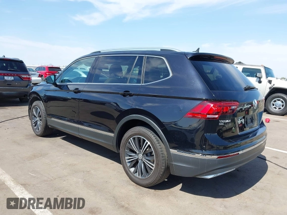 2018 Volkswagen Tiguan SEL with VIN 3VV3B7AX4JM056650, listed as a IAAI auction lot 42394948 with 35,696 mi miles and . Bid and sale history available at DreamBid. Image 3.