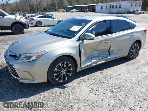 2018 Toyota Avalon XLE with VIN 4T1BK1EB9JU283488, listed as a IAAI auction lot 41777239 with 97,893 mi miles and . Bid and sale history available at DreamBid. Image 2.