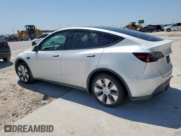 2023 Tesla Model Y Long Range z VIN 7SAYGDEE1PA155629, wystawiony jako Copart lot #52234735 z przebiegiem 24 944 mil mil oraz Szkoda całkowita • Salvage title. Historia ofert i sprzedaży dostępna na DreamBid. Obrazek 2.