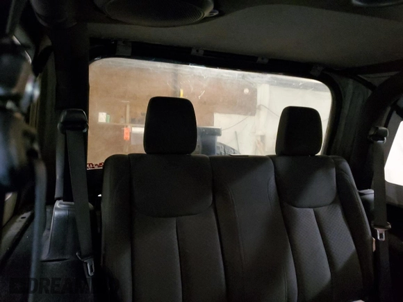 2014 Jeep Wrangler Sport with VIN 1C4AJWAG5EL307945, listed as a Copart auction lot 60152035 with 119,508 mi miles and Salvage title. Bid and sale history available at DreamBid. Image 11.