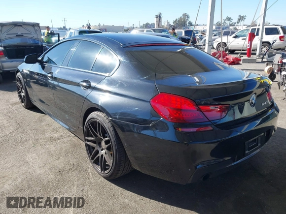 2015 BMW 6 Series 640i with VIN WBA6A0C52FGB53591, listed as a IAAI auction lot 41247695 with 81,828 mi miles and . Bid and sale history available at DreamBid. Image 3.
