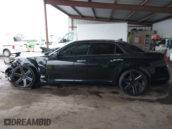 2016 Chrysler 300 with VIN 2C3CCAEG3GH348420, listed as a IAAI auction lot 41092322 with 111,929 mi miles. Bid and sale history available at carsss.com. Image 15.
