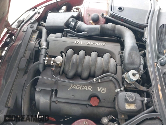 1997 Jaguar XK with VIN SAJGX274XVC004952, listed as a IAAI auction lot 42211023 with 109,889 mi miles and . Bid and sale history available at DreamBid. Image 10.