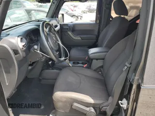 2015 Jeep Wrangler Freedom Edition with VIN 1C4AJWAG8FL688255, listed as a Copart auction lot 59722165 with 130,666 mi miles and Salvage title. Bid and sale history available at DreamBid. Image 7.