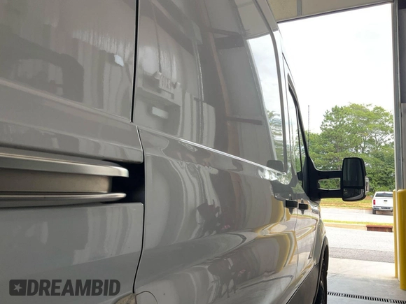 2021 Ford Transit Cargo with VIN 1FTBR1CG4MKA80751, listed as a IAAI auction lot 42859733 with 80,844 mi miles and . Bid and sale history available at DreamBid. Image 12.