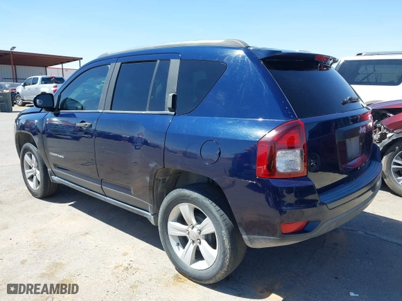 2014 Jeep Compass Sport with VIN 1C4NJCBB2ED737297, listed as a IAAI auction lot 42056598 with 185,155 mi miles. Bid and sale history available at carsss.com. Image 3.