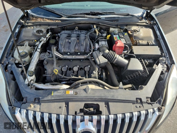 2010 Mercury Milan Premier z VIN 3MEHM0JG9AR644308, wystawiony jako Copart lot #60791825 z przebiegiem 83 910 mil mil oraz Szkoda całkowita • Salvage title. Historia ofert i sprzedaży dostępna na DreamBid. Obrazek 11.