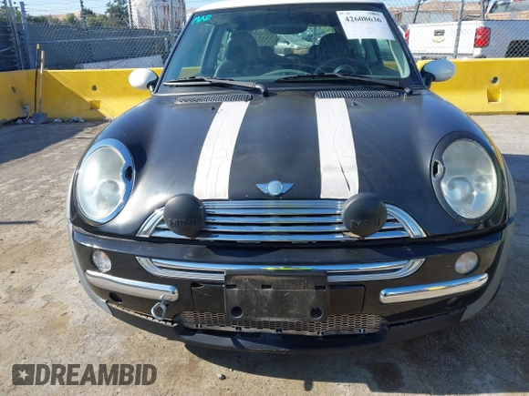 2002 MINI Hardtop with VIN WMWRC33402TC32985, listed as a IAAI auction lot 42608636 with 159,996 mi miles and . Bid and sale history available at DreamBid. Image 6.
