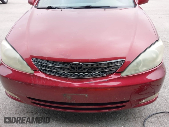 2003 Toyota Camry LE with VIN 4T1BE30K03U227243, listed as a IAAI auction lot 42063924 with 177,323 mi miles and . Bid and sale history available at DreamBid. Image 6.