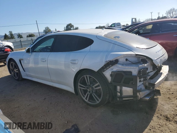 2013 Porsche Panamera z VIN WP0AA2A77DL010893, wystawiony jako Copart lot #42727885 z przebiegiem 143 353 mil mil oraz Szkoda całkowita • Salvage title. Historia ofert i sprzedaży dostępna na DreamBid. Obrazek 2.