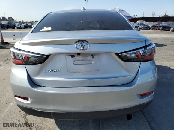 2019 Toyota Yaris Sedan L with VIN 3MYDLBYV2KY507562, listed as a Copart auction lot 64407884 with 85,982 mi miles and Salvage Title. Bid and sale history available at carsss.com. Image 6.