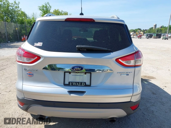 2015 Ford Escape Titanium with VIN 1FMCU9J94FUA65188, listed as a IAAI auction lot 42516728 with 65,969 mi miles and . Bid and sale history available at DreamBid. Image 16.