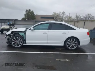 2015 Audi A6 Premium Plus with VIN WAUFGAFC8FN005114, listed as a IAAI auction lot 41808681 with Not provided miles and . Bid and sale history available at DreamBid. Image 14.