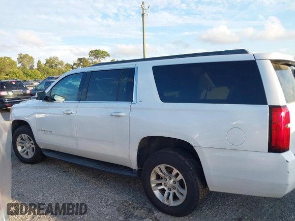 2018 Chevrolet Suburban LT with VIN 1GNSCHKC8JR358781, listed as a IAAI auction lot 40474820 with Not Provided miles and . Bid and sale history available at DreamBid. Image 14.