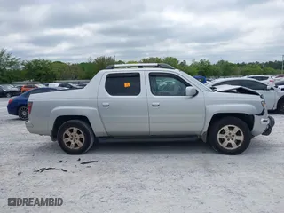 2008 Honda Ridgeline RTL with VIN 2HJYK16568H527114, listed as a IAAI auction lot 42042902 with 127,159 mi miles. Bid and sale history available at carsss.com. Image 13.