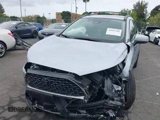 2023 Toyota Corolla Cross XLE with VIN 7MUEAABG8PV077117, listed as a IAAI auction lot 42052305 with 21,571 mi miles and . Bid and sale history available at DreamBid. Image 11.