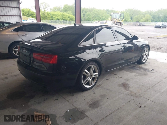 2014 Audi A6 Premium Plus with VIN WAUGFAFC1EN164580, listed as a IAAI auction lot 42220550 with 112,528 mi miles and . Bid and sale history available at DreamBid. Image 4.