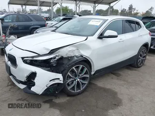 2022 BMW X2 sDrive28i z VIN WBXYH9C06N5U37719, wystawiony jako IAAI lot #42355050 z przebiegiem 33 127 mil mil oraz . Historia ofert i sprzedaży dostępna na DreamBid. Obrazek 16.