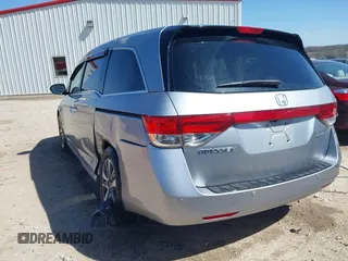 2016 Honda Odyssey Touring Elite with VIN 5FNRL5H96GB090653, listed as a IAAI auction lot 41720195 with 68,969 mi miles. Bid and sale history available at carsss.com. Image 3.