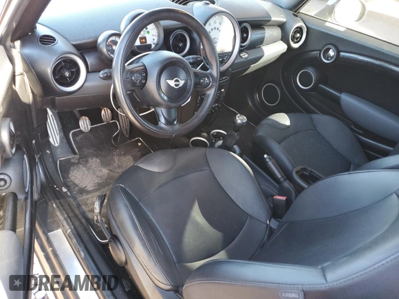2012 MINI Convertible S z VIN WMWZP3C53CT296188, wystawiony jako Copart lot #88159445 z przebiegiem 110 859 mil mil oraz Szkoda całkowita • Salvage title. Historia ofert i sprzedaży dostępna na DreamBid. Obrazek 8.