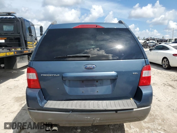 2005 Ford Freestyle SEL z VIN 1FMDK021X5GA25385, wystawiony jako Copart lot #72239954 z przebiegiem 161 219 mil mil oraz Szkoda całkowita • Salvage title. Historia ofert i sprzedaży dostępna na DreamBid. Obrazek 6.