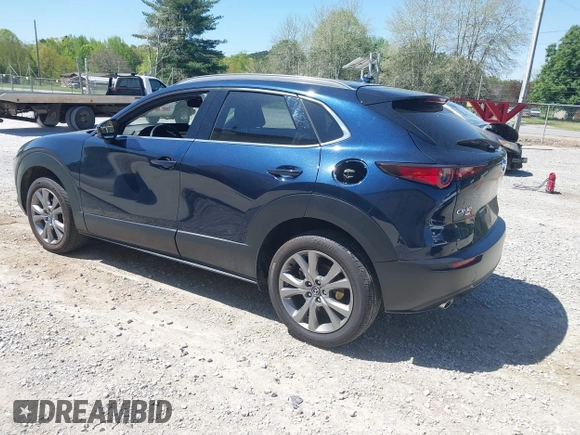 2024 Mazda CX-30 2.5 S Premium Package with VIN 3MVDMBDM7RM654243, listed as a IAAI auction lot 42044783 with 27,936 mi miles. Bid and sale history available at carsss.com. Image 3.