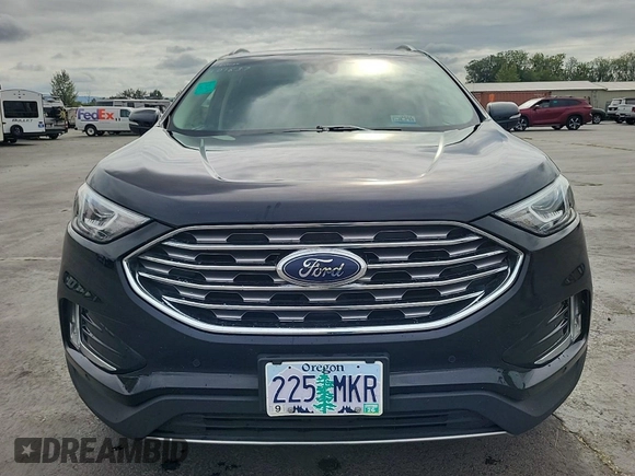 2020 Ford Edge Titanium with VIN 2FMPK3K99LBA73839, listed as a IAAI auction lot 42843885 with 92,381 mi miles and . Bid and sale history available at DreamBid. Image 19.