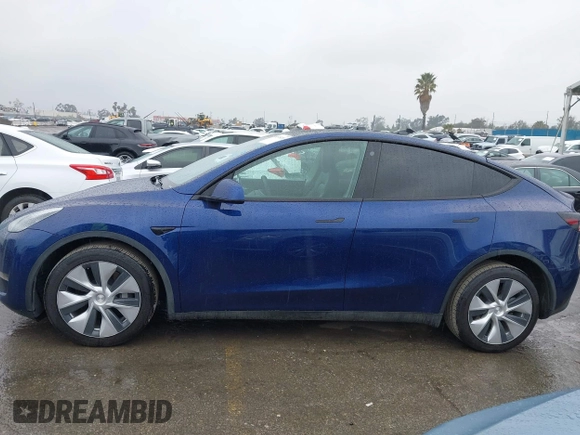 2022 Tesla Model Y Long Range with VIN 7SAYGDEE8NF511395, listed as a IAAI auction lot 41595310 with 65,156 mi miles and . Bid and sale history available at DreamBid. Image 14.