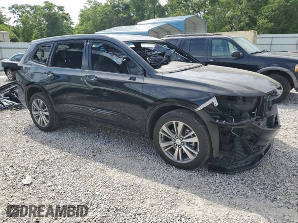 2022 Cadillac XT6 Premium Luxury with VIN 1GYKPCRS8NZ104419, listed as a Copart auction lot 53070035 with 72,559 mi miles and Salvage title. Bid and sale history available at DreamBid. Image 4.
