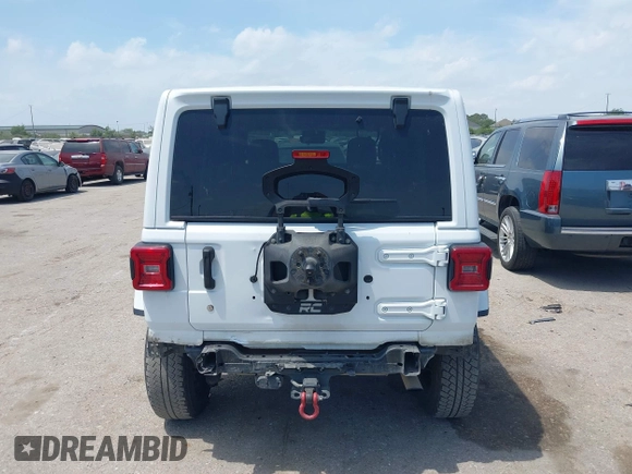 2018 Jeep Wrangler Unlimited Sahara z VIN 1C4HJXEG0JW245118, wystawiony jako IAAI lot #42066614 z przebiegiem 83 743 mil mil oraz . Historia ofert i sprzedaży dostępna na DreamBid. Obrazek 17.