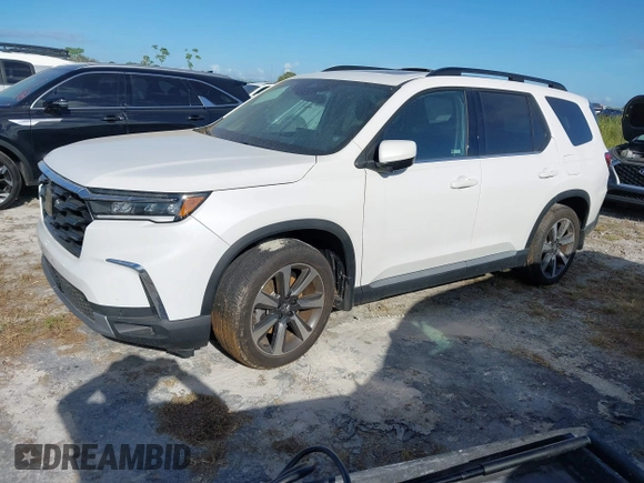 2024 Honda Pilot Elite with VIN 5FNYG1H81RB025163, listed as a IAAI auction lot 40502507 with 9,867 mi miles. Bid and sale history available at carsss.com. Image 2.